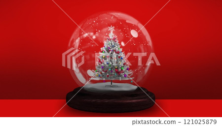 Image of christmas tree in snow globe over red background 121025879