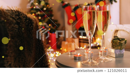 Abstract vector illustration of champagne glasses and gifts on table in living room Abstract vector illustration of champagne glasses and gifts on table in living room 121026011