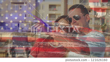American flag grunge design effect against caucasian couple pointing towards a direction 121026160