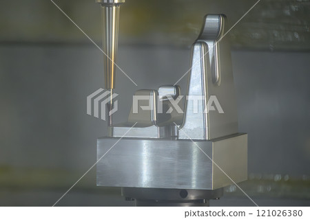 The CNC milling machine cutting mold part by solid ball nose end mill tool. The CNC milling machine cutting mold part by solid ball nose end mill tool. 121026380