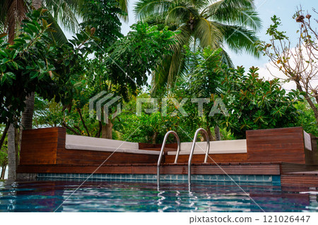 Experience a Luxurious Poolside Retreat Nestled in a Tropical Paradise for Ultimate Relaxation Experience a Luxurious Poolside Retreat Nestled in a Tropical Paradise for Ultimate Relaxation 121026447