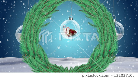 Image of fir tree wreath over snow falling and baubles on winter landscape Image of fir tree wreath over snow falling and baubles on winter landscape 121027103