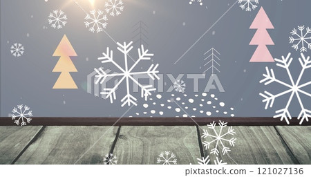 Image of snowflakes falling over christmas trees and pattern with wooden surface 121027136
