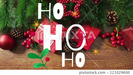 Image of ho ho ho text over christmas decorations 121029680