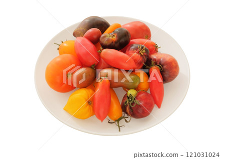 Tomatoes in a ceramic plate isolate on white background. Variety sweet vegetables in rural bowl. Juicy raw tomato. Tomatoes in a ceramic plate isolate on white background. Variety sweet vegetables in rural bowl. Juicy raw tomato. 121031024