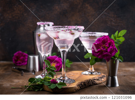 Assortment of pink cocktails with rose syrup. Assortment of pink cocktails with rose syrup. 121031096