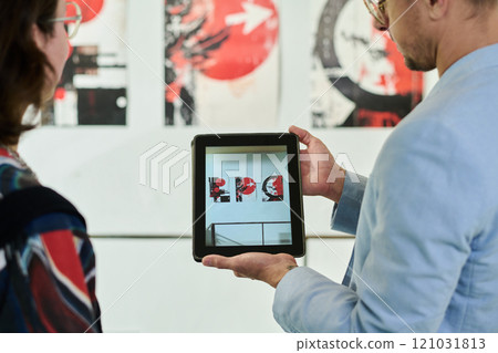 Preparing for opening of art exhibition 121031813