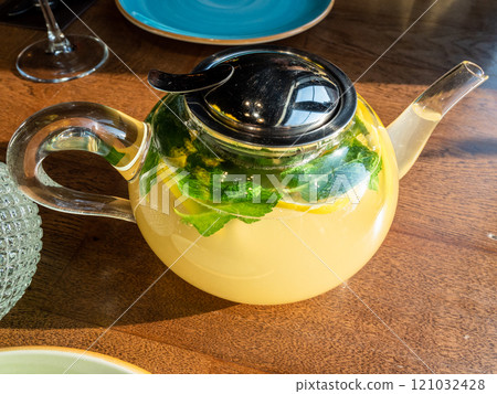 glass teapot with mint, ginger tea with lemon glass teapot with mint, ginger tea with lemon 121032428