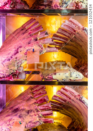 view of many beef ribs in dry aging fridge view of many beef ribs in dry aging fridge 121032434