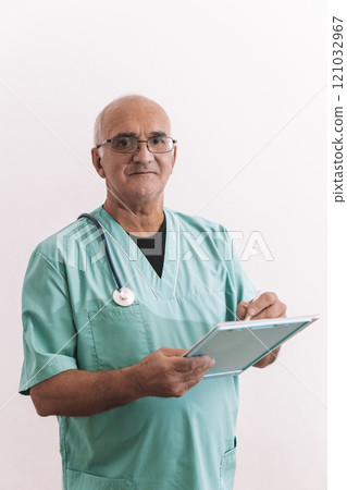 Doctor isolate. Male doctor in medical uniform on empty white background. 121032967