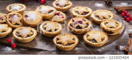 Box of homemade mince pies. Traditional sweet Christmas food. Box of homemade mince pies. Traditional sweet Christmas food. 121035404