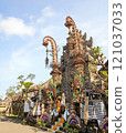 Editorial image of tourists exploring Panglipuran Village in Bali on November 9, 2024, beautifully adorned with penjor decorations for Galungan and Kuningan celebrations. 121037033