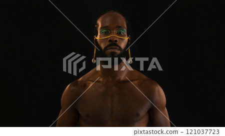 Serious African American shirtless gay model with 121037723