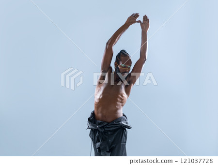 Black shirtless gay model with hands raised posing Black shirtless gay model with hands raised posing 121037728