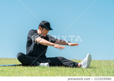 Stiff man, stretching, flexibility exercises, warming up Stiff man, stretching, flexibility exercises, warming up 121039980