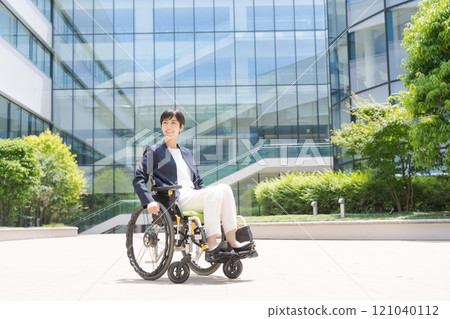 Wheelchair user in a suit 121040112