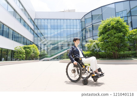 Wheelchair user in a suit 121040118