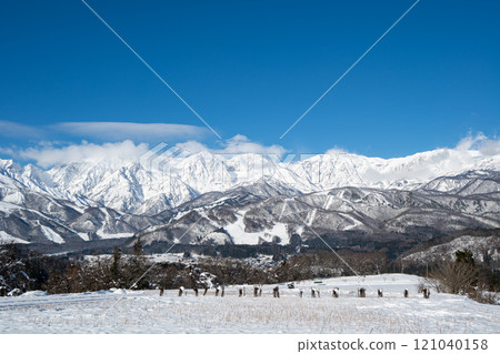 Blue skies and snow in the Northern Alps, Hakuba Village, Nagano Prefecture Blue skies and snow in the Northern Alps, Hakuba Village, Nagano Prefecture 121040158