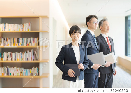 Business people lined up in the office Business people lined up in the office 121040230