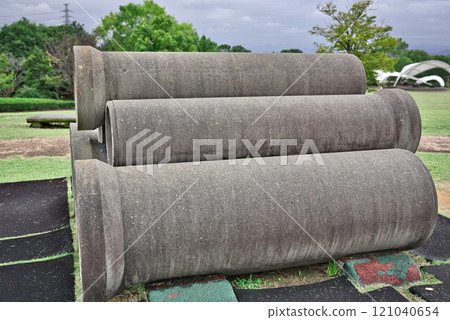 Stacked clay pipes 121040654