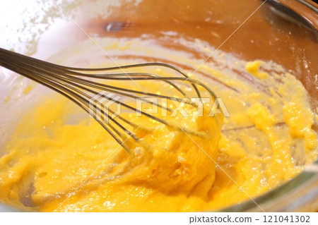 Cooking with a whisk 121041302