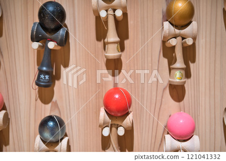 A Kendama attached to the wall 121041332