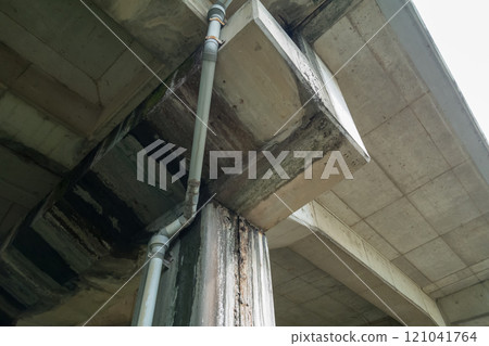 Dirty concrete of a railway overpass 121041764