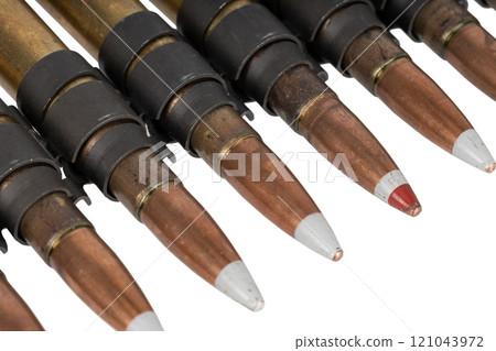 .50 BMG caliber machine gun ammunition belt with cartridges. 121043972