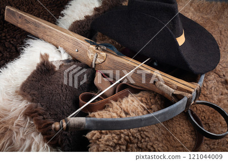 vintage medieval crossbow on fur background 121044009
