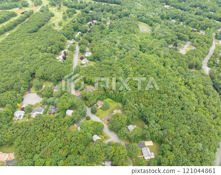Aerial view of Suburban neighborhood Norfolk County, Massachusetts with green forest, with big villa Aerial view of Suburban neighborhood Norfolk County, Massachusetts with green forest, with big villa 121044861