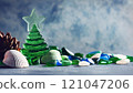 Decorative Glass Christmas Tree Surrounded By Colorful Beach Pebbles 121047206