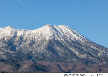 Mount Ontake in winter illuminated by the morning sun Mount Ontake in winter illuminated by the morning sun 121047453