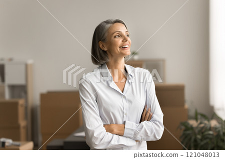 Positive pretty grey haired small business owner portrait 121048013