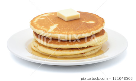 Stack fluffy pancakes topped with butter and syrup on white plate, isolated on white background, breakfast or brunch, appetizing and delicious meal, close-up 121048503