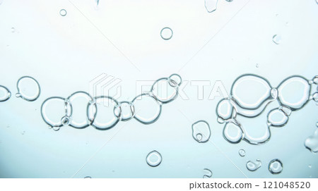Clear water bubbles floating in liquid, close-up view of transparent bubbles in water, abstract background with air bubbles, fresh and clean water, purity and freshness concept 121048520