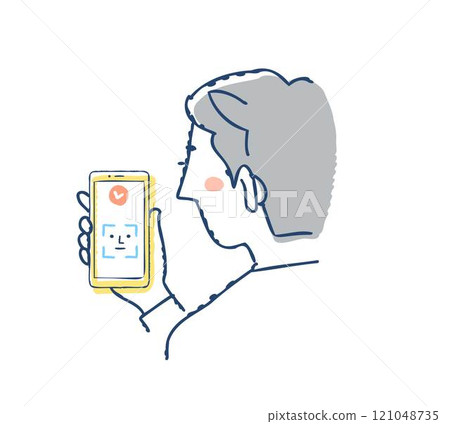 Face ID: A man using face recognition on a smartphone 121048735