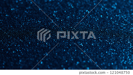 Blurred sparkling. Blue powder. Flare shimmering festive surface with fine metallic dust. Glamour starry particles texture effect. 121048750