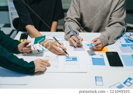 UX graphic designer planning application process development prototype wireframe for web smart phone. 121049505