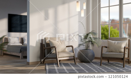 A modern, minimalist apartment or hotel room featuring a living space connected to a bedroom. 121050124