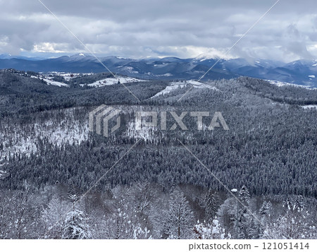 Snowy Mountain Landscape Under Cloudy Sky Snowy Mountain Landscape Under Cloudy Sky 121051414