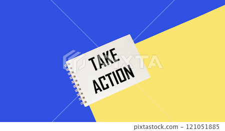 notepad on a yellow - blue background with the text Take action notepad on a yellow - blue background with the text Take action 121051885