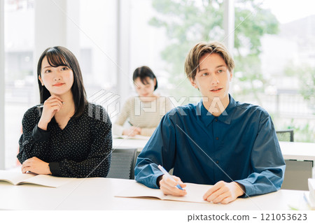 University students taking classes 121053623