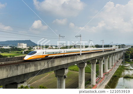 Overlooking view of the Taiwan High Speed Rail trains passing the Waipu of Taichung in Taiwan, It is the only high-speed railway in Taiwan. Overlooking view of the Taiwan High Speed Rail trains passing the Waipu of Taichung in Taiwan, It is the only high-speed railway in Taiwan. 121053919