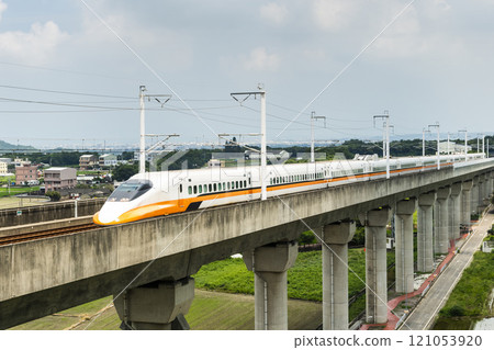 Overlooking view of the Taiwan High Speed Rail trains passing the Waipu of Taichung in Taiwan, It is the only high-speed railway in Taiwan. Overlooking view of the Taiwan High Speed Rail trains passing the Waipu of Taichung in Taiwan, It is the only high-speed railway in Taiwan. 121053920