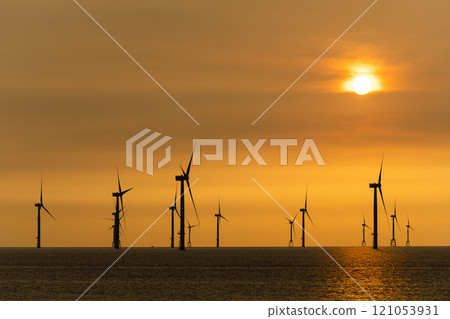 Sunset view of the Offshore wind power systems off the western coast of Taiwan. 121053931