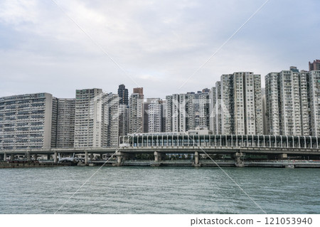 Hong Kong Island's waterfront lined with high-rise residential buildings Hong Kong Island's waterfront lined with high-rise residential buildings 121053940