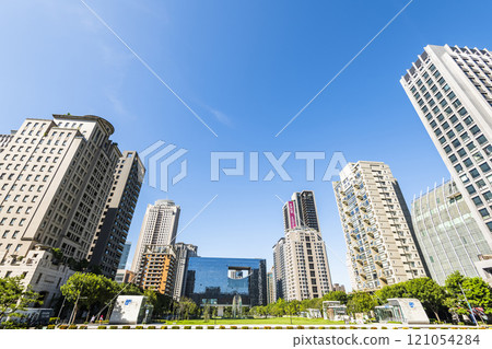 View of the park and surrounding modern buildings in front of Taichung City Council, Taiwan. 121054284
