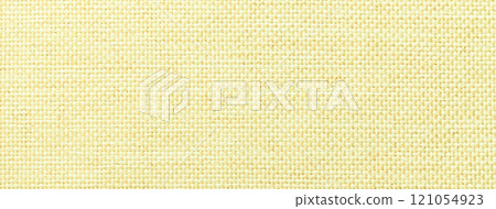 Texture light yellow background from woven textile with wicker pattern, macro. Structure vintage fabric 121054923