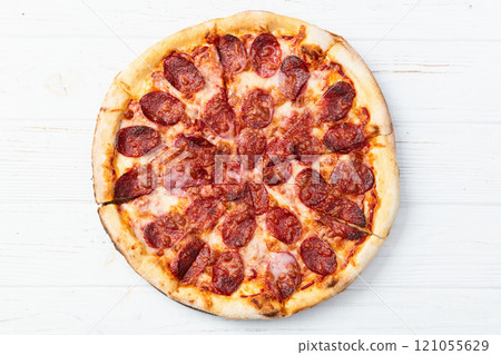 Pizza pepperoni fast food . Top view on rustic background Pizza pepperoni fast food . Top view on rustic background 121055629