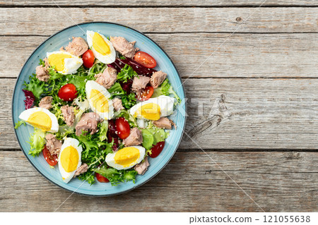 Canned Tuna salad with eggs and tomatoes photography . Top view 121055638